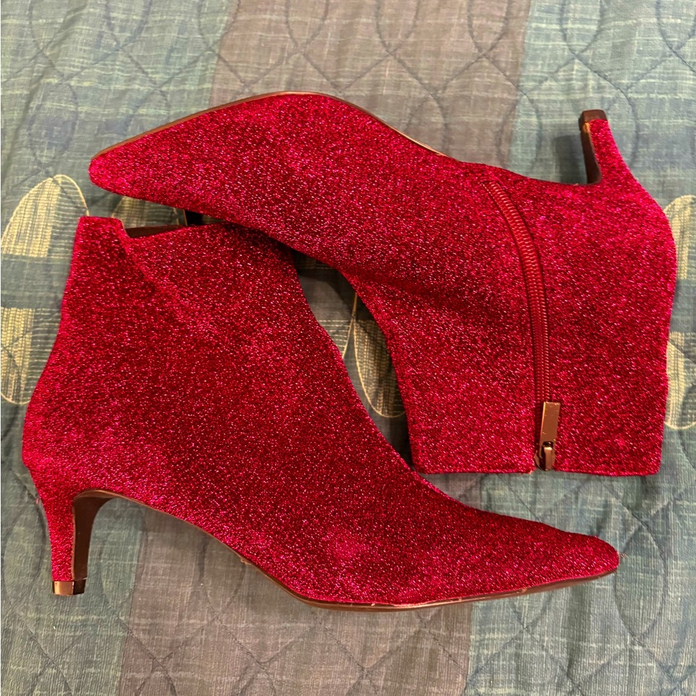 Magenta sparkle kitten heel bootie.